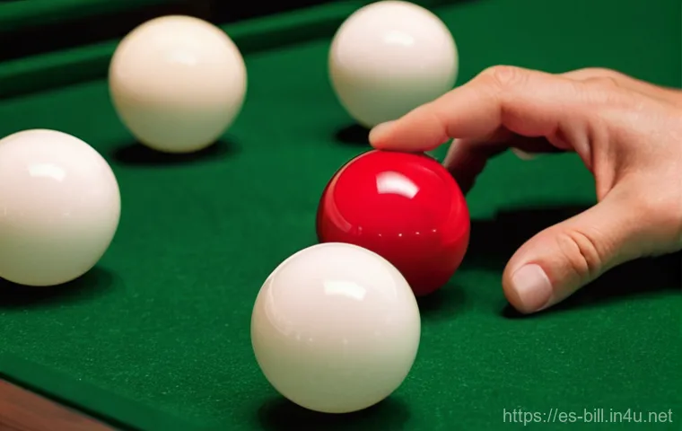 3구 당구 공 규격 - **Prompt:** A focused, professional male billiards player, in his late 30s, wearing a crisp polo shi...
